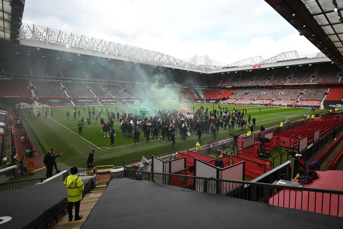 Supporters protest against Manchester United's owners, inside English Premier League club Manchester United's Old Trafford stadium.