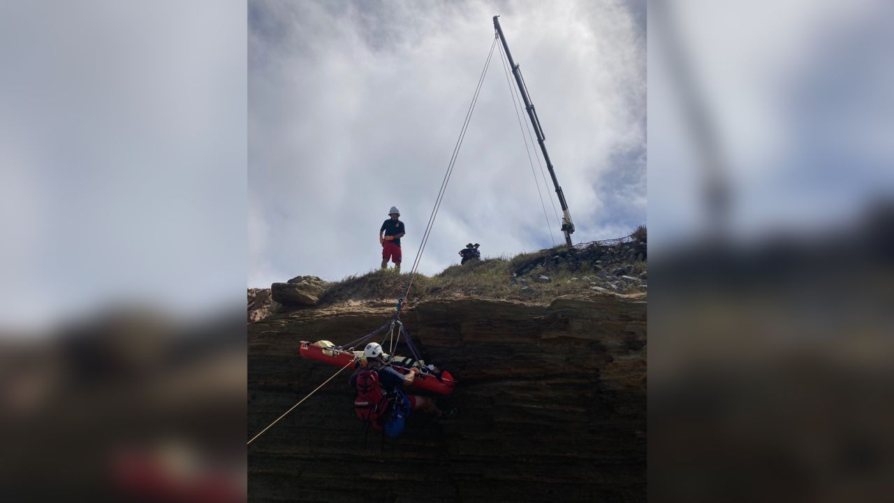 The City of San Diego Fire-Rescue Department posted the following photos of their rescue operation and wreckage after a boat officials believe was used for human smuggling struck a reef.