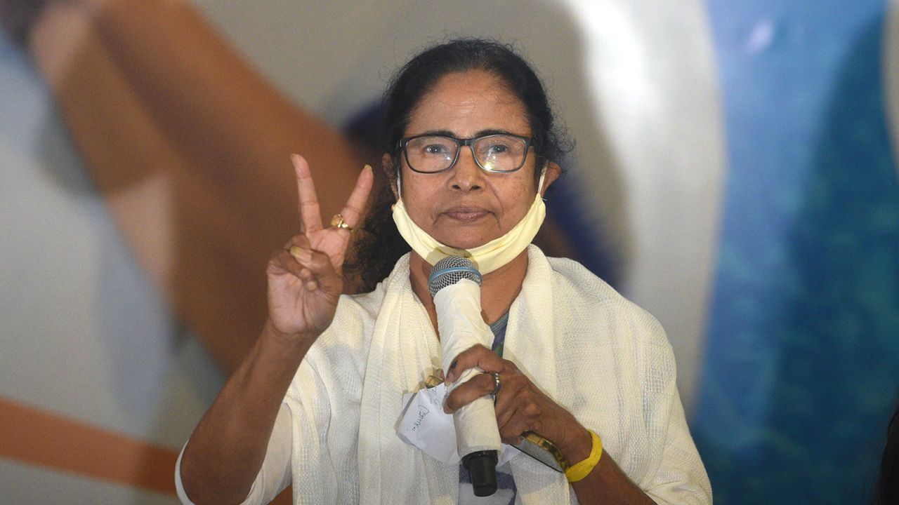 West Bengal Chief Minister Mamata Banerjee shows the victory sign after the announcement of state election results in Kolkata on May 2. 