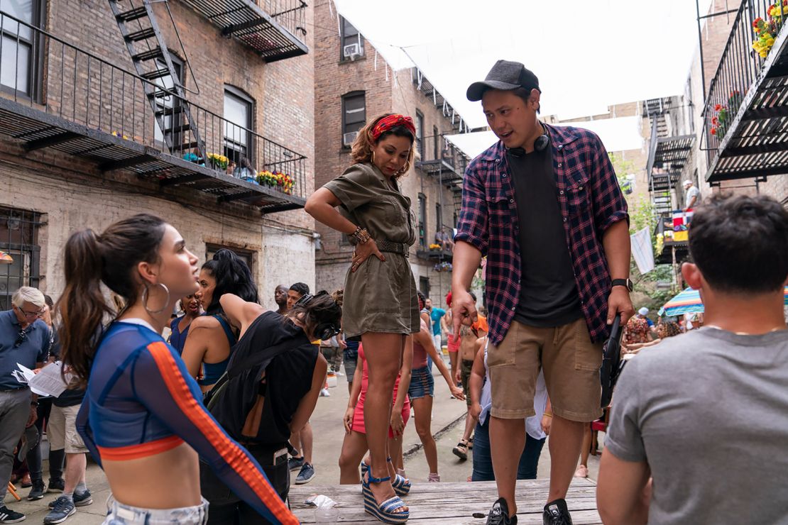Melissa Barrera, Daphne Rubin-Vega and Jon M. Chu on the set of Warner Bros. Pictures "In the Heights."