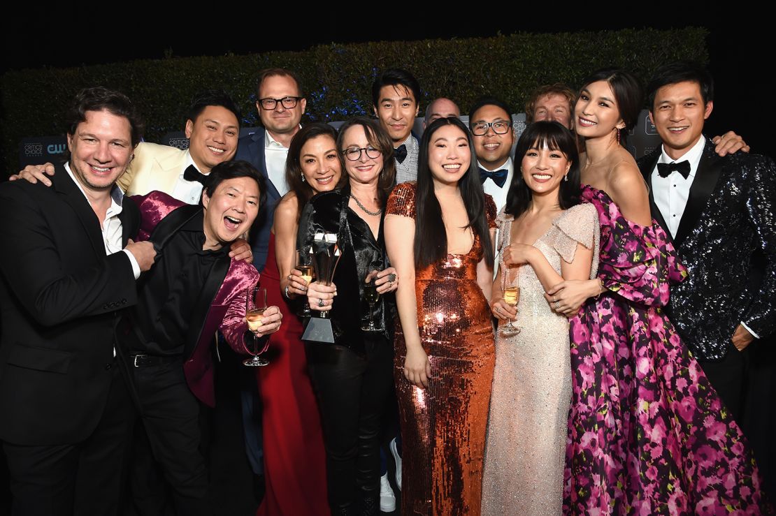 Crazy Rich Asians' cast and crew celebrate their win for Best Comedy Movie at the Critics Choice Awards in January 2019.