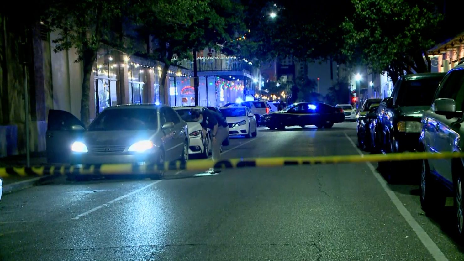 Police tape cordons off the scene of a shooting in New Orleans on Sunday.