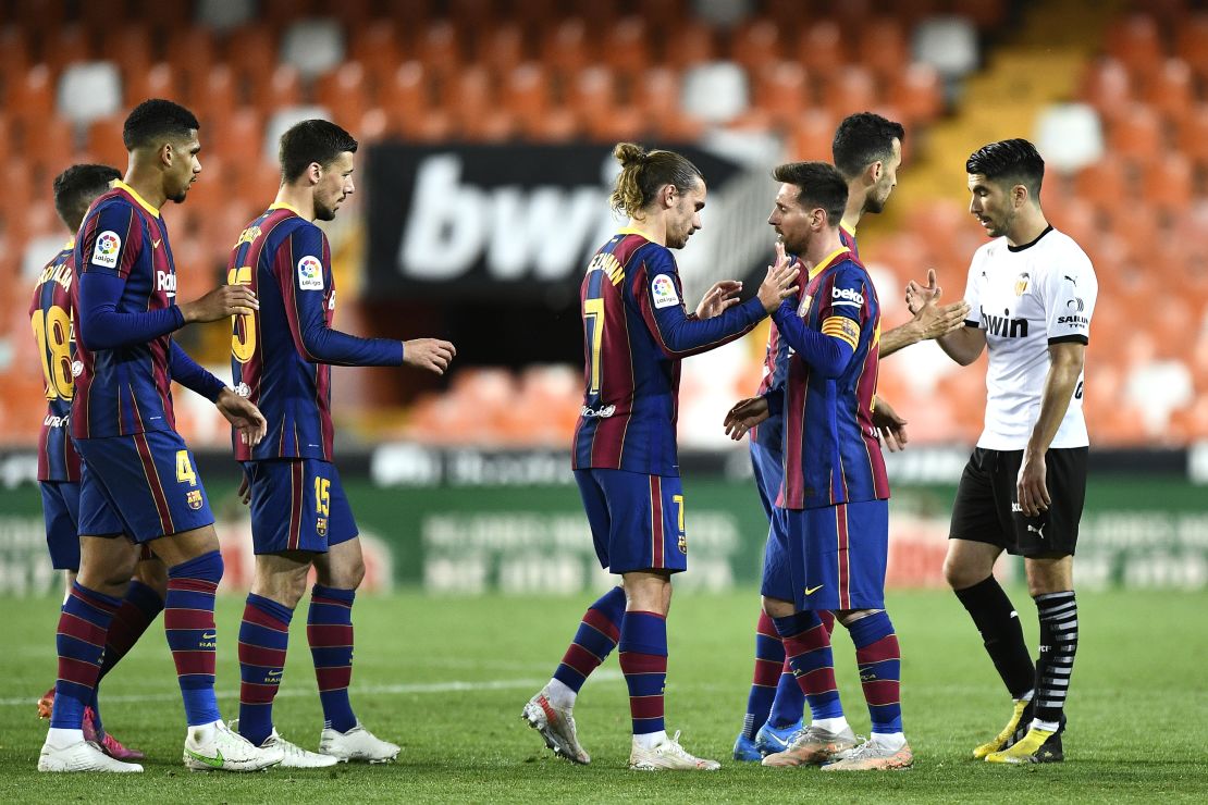 Barcelona players celebrate after the final whistle. 