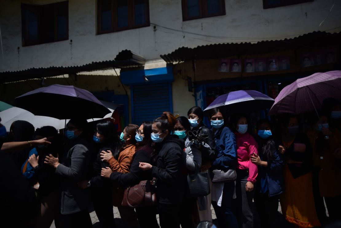 Nepalis queue for vaccine doses at Alka Hospital, Lalitpur, Nepal on April 22, 2021. 