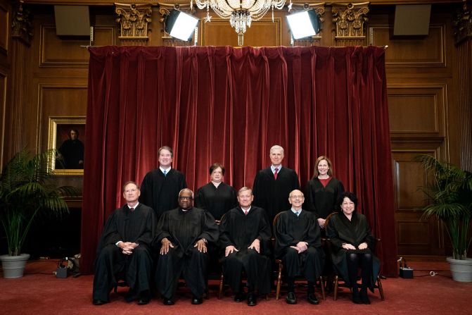 Members of the US Supreme Court <a href="index.php?page=&url=https%3A%2F%2Fwww.cnn.com%2F2021%2F04%2F23%2Fpolitics%2Famy-coney-barrett-supreme-court-picture%2Findex.html" target="_blank">pose for a group photo </a>in Washington, DC, in April 2021. Seated from left are Samuel Alito, Clarence Thomas, Chief Justice John Roberts, Breyer and Sonia Sotomayor. Standing behind them, from left, are Brett Kavanaugh, Elena Kagan, Neil Gorsuch and newest Justice Amy Coney Barrett.