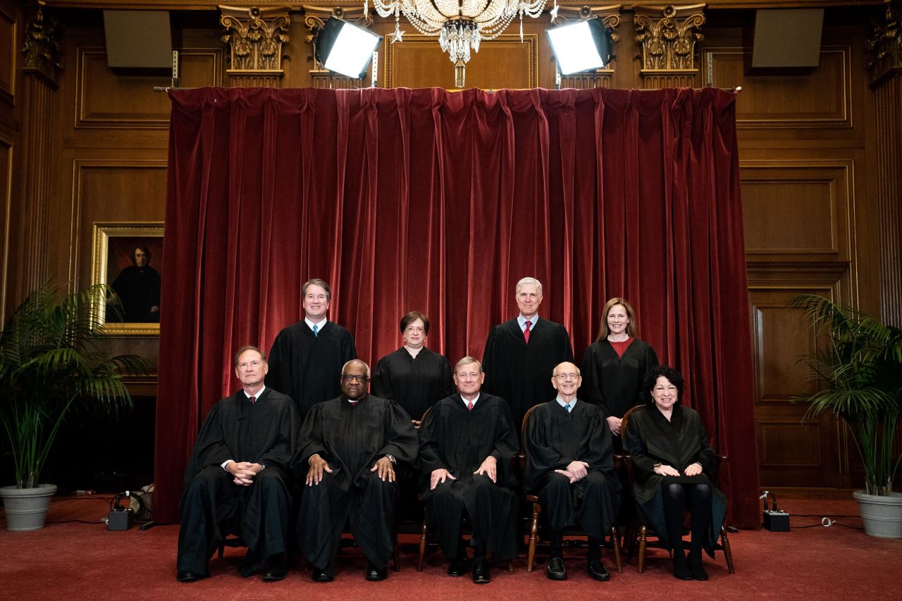 Members of the US Supreme Court <a href="https://www.cnn.com/2021/04/23/politics/amy-coney-barrett-supreme-court-picture/index.html" target="_blank">pose for a group photo </a>in Washington, DC, in April 2021. Seated from left are Samuel Alito, Clarence Thomas, Chief Justice John Roberts, Breyer and Sonia Sotomayor. Standing behind them, from left, are Brett Kavanaugh, Elena Kagan, Neil Gorsuch and newest Justice Amy Coney Barrett.