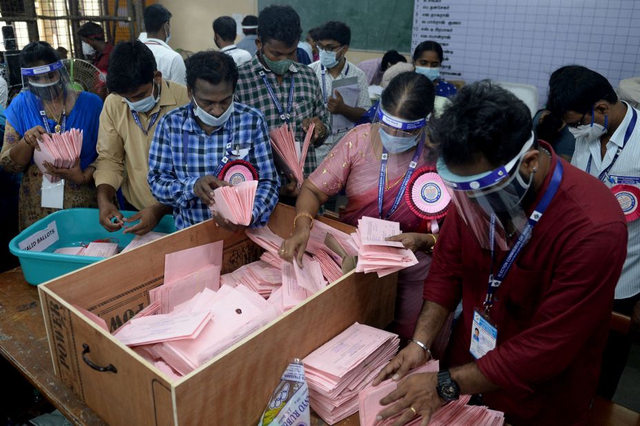 Officials in Chennai prepare to open postal ballots for state elections, which have taken place during this second wave of Covid-19.