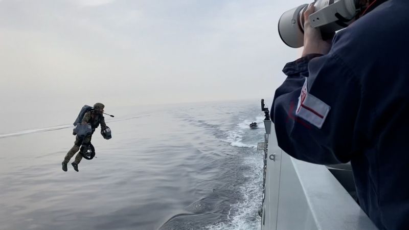Watch these UK commandos fly over the sea with new jet pack | CNN Business