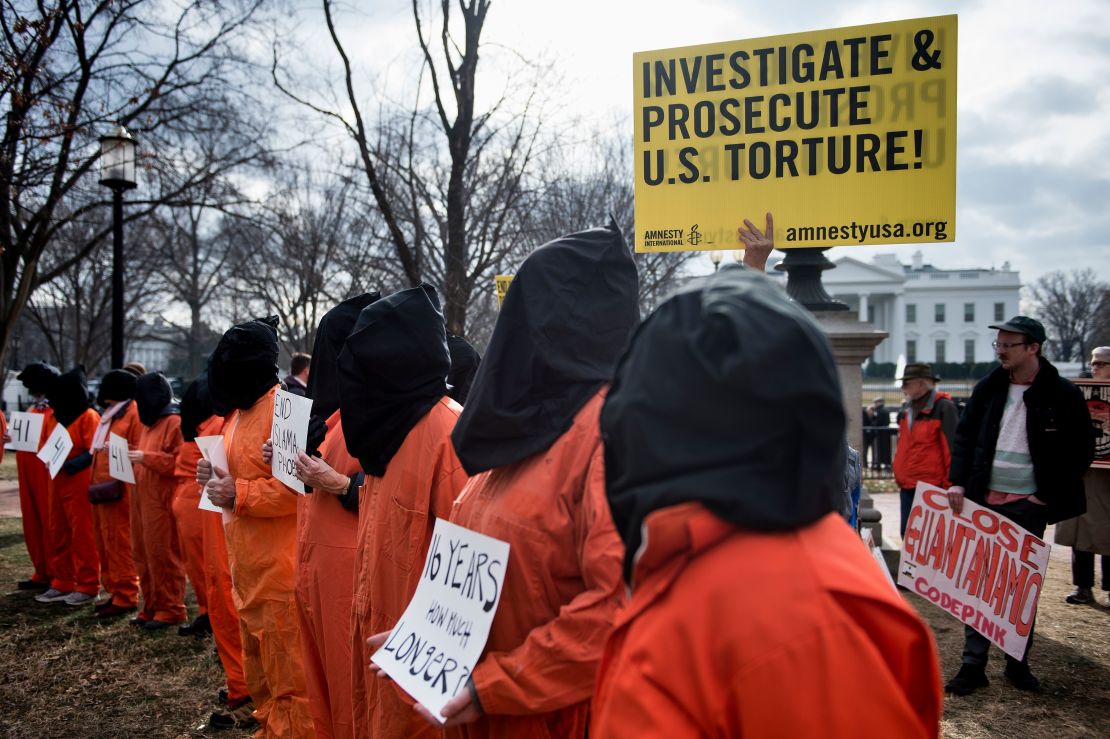 Protesters call for the closure of the Guantanamo Bay detention camp during a rally in Washington DC in January 2018.