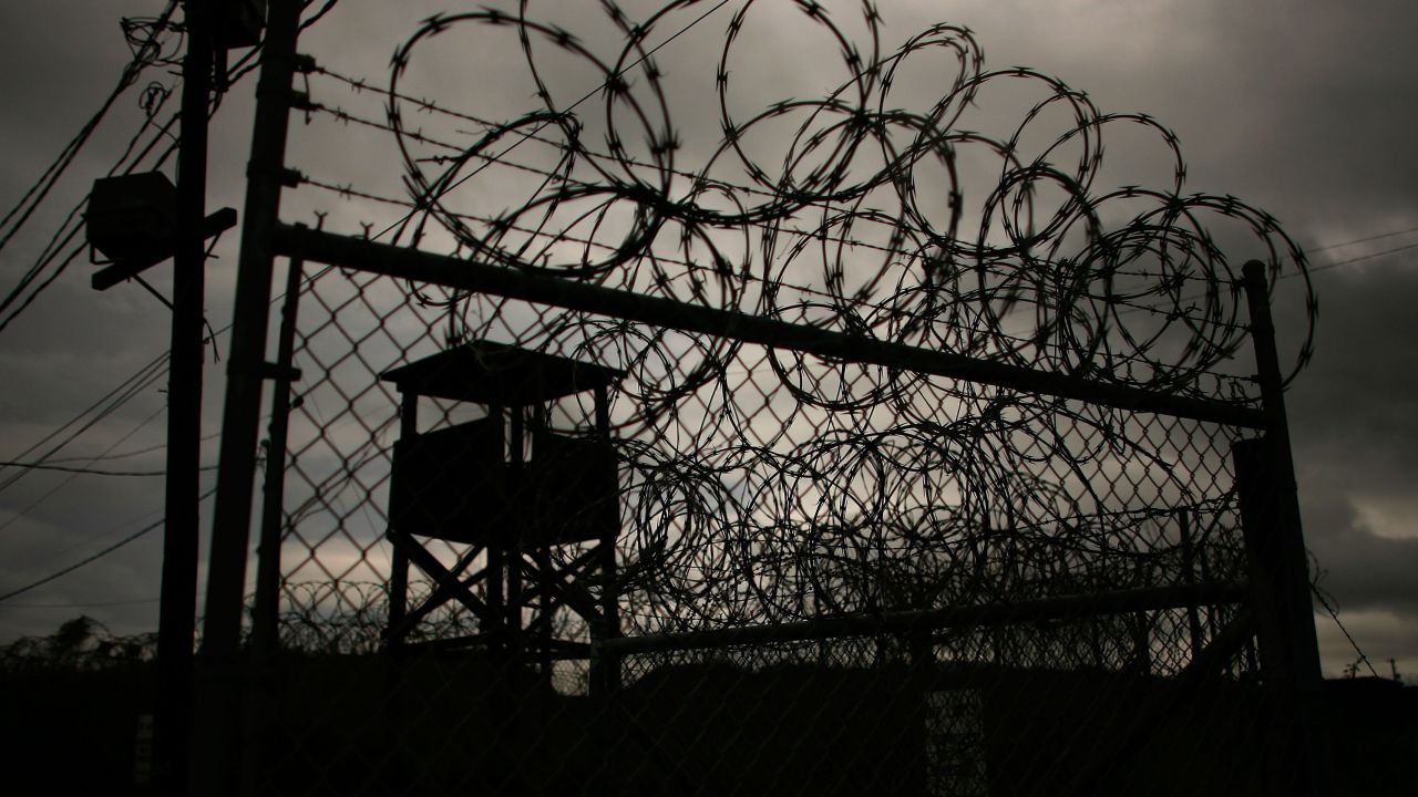 Camp X-Ray, the first detention facility to hold "enemy combatants" at the US Naval Station at Guantanamo Bay, stands vacant and overgrown October 3, 2007, after detainees were moved to newer facilities on the base.