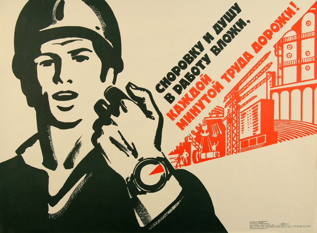 A 1980 Soviet poster depicts a worker in hardhat with his wristwatch projecting the image of a factory.