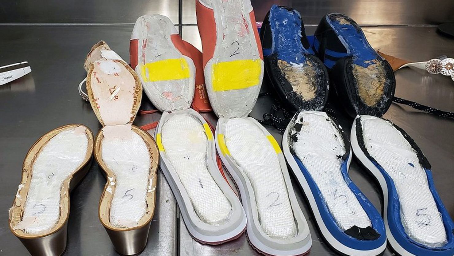 Border officials released this image showing some of the shoes with drugs in them.