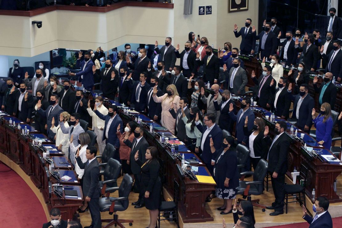 Ruling party New Ideas lawmakers are sworn-in at the Congress in San Salvador, El Salvador, Saturday, May 1, 2021.