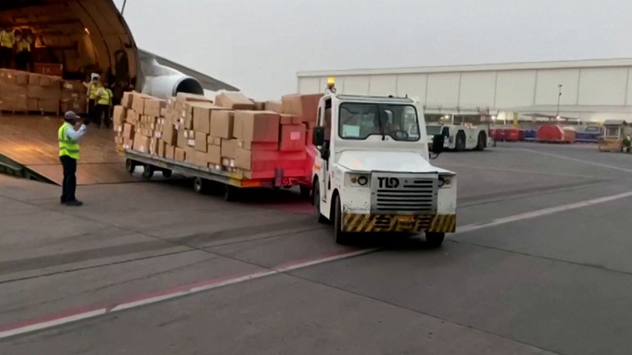 Foreign aid supplies being unloaded from planes at the airport in New Delhi, India, on April 29.