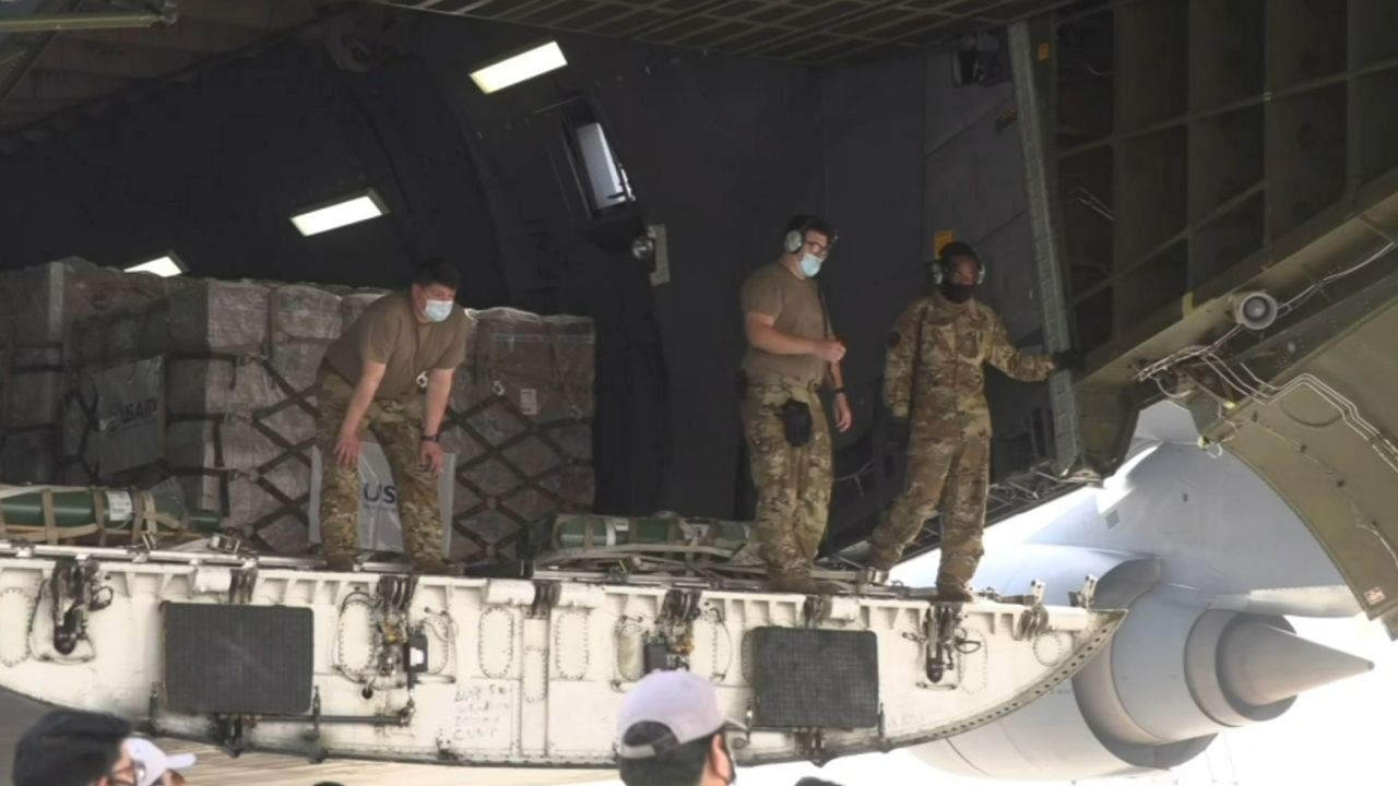 A military aircraft carrying emergency aid arrives from the US in New Delhi, India.
