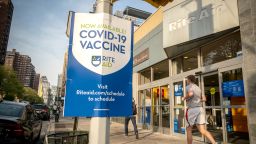 A sign in front of a Rite Aid drugstore in New York on Wednesday, April 28, 2021 advertises the availability of the COVID-19 vaccine. (¬Photo by Richard B. Levine)