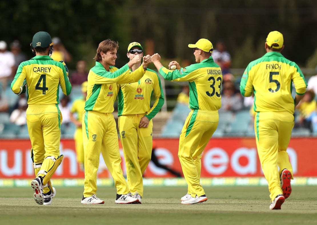 Adam Zampa of Australia  celebrates after taking the wicket of Shreyas Iyer of India during game three of the One Day International series between Australia and India at Manuka Oval on December 02, 2020 in Canberra, Australia. 