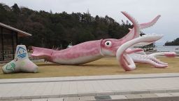 A giant squid statue built using coronavirus disease (COVID-19) subsidies is seen in Noto, Ishikawa prefecture, Japan April 13, 2021, in this still image obtained from a social media video. Courtesy of Youtube@TheTonarinopoti/Social Media via REUTERS. ATTENTION EDITORS - THIS IMAGE HAS BEEN SUPPLIED BY A THIRD PARTY. MANDATORY CREDIT YOUTUBE@TheTonarinopoti. NO RESALES. NO ARCHIVES.