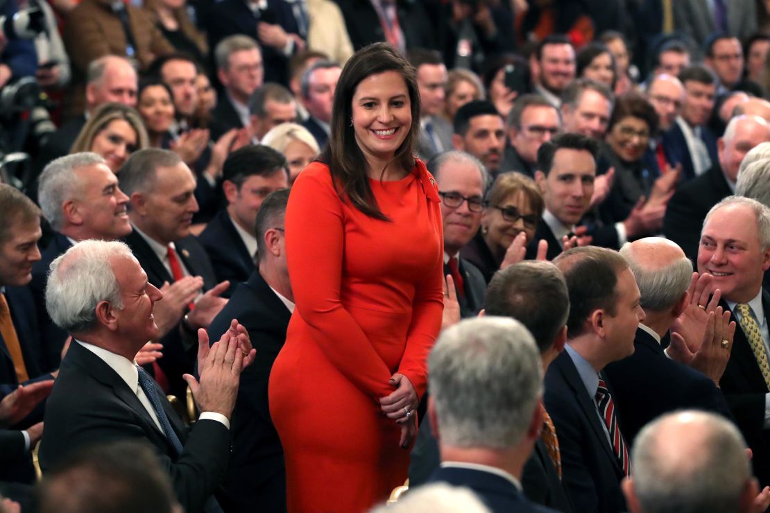 Rep. Elise Stefanik a New York Republican stands as she's acknowledged by then-President Donald Trump as he speaks one day after the Senate acquitted him on two articles of impeachment, at the White House in February 2020 in Washington, DC. 