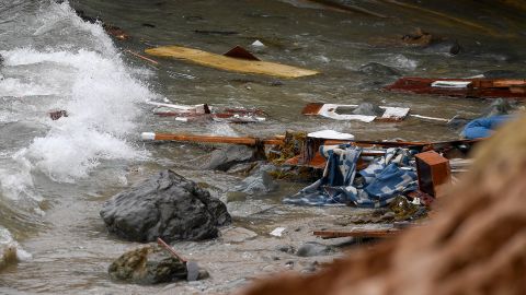 Wreckage and debris from a capsized boat washes ashore just off the San Diego coast on May 2, 2021.