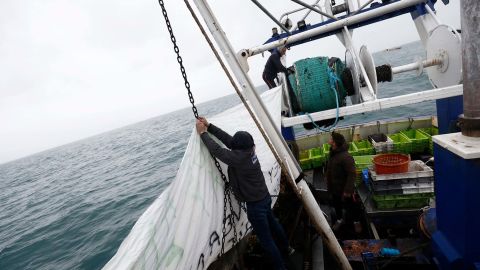 French fishermen hang a protest banner from their vessel near Jersey on May 6.