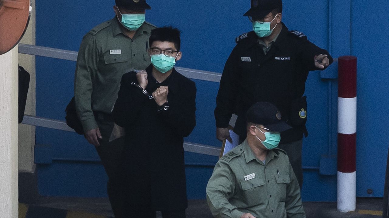 Pro-democracy activist Joshua Wong leaves Lai Chi Kok prison in Hong Kong for a court appearance in December 2020. 