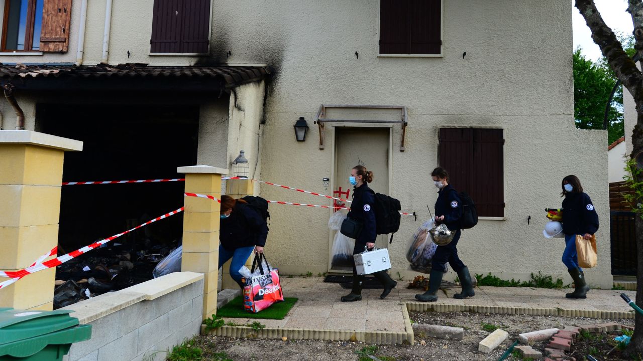 Forensics officers arrive at the home of Chahinez Daoud on May 5, 2021 in Merignac, Bordeaux.