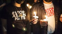 Mourners gather at the Arizona Capitol in Phoenix for a candlelight vigil on March 19, 2021, for victims of recent anti-Asian hate crimes.