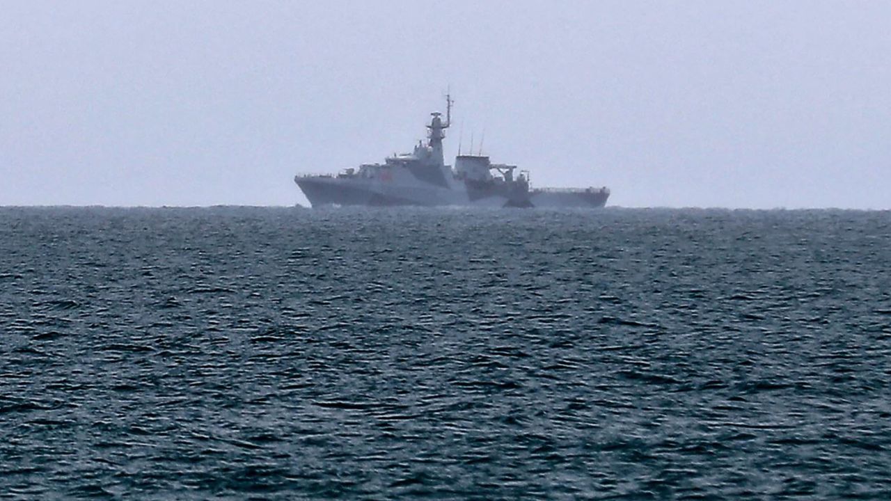 A British Royal Navy vessel patrols the waters off Jersey on May 6 to monitor the protest by French fishermen.