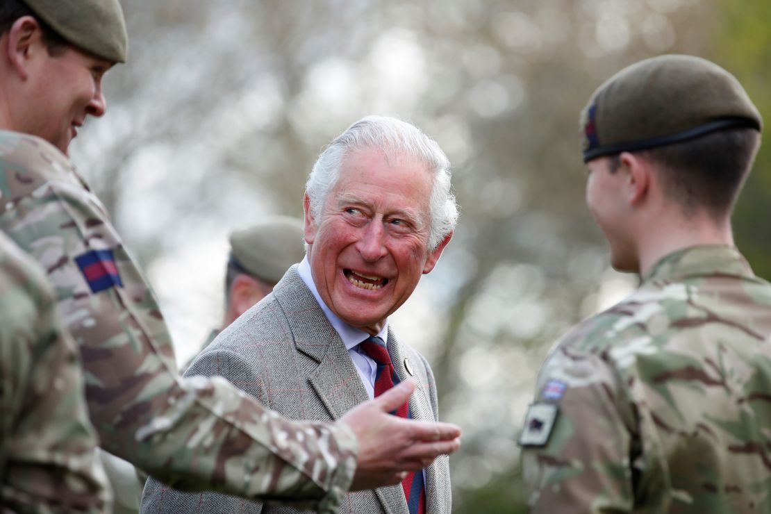 Prince Charles shares a joke with soldiers of the Welsh Guards during a visit to Combermere Barracks on May 5 in Windsor, England. 