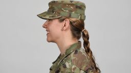 U.S. Army Soldier wearing new approved ponytail hair style.