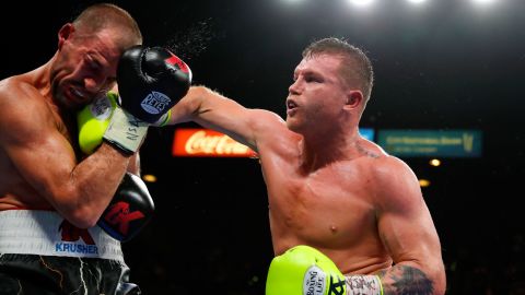 Canelo Alvarez (R) connects on Sergey Kovalev during their WBO light heavyweight title fight at MGM Grand Garden Arena on November 2, 2019 in Las Vegas, Nevada. Alvarez won with an 11th-round knockout.
