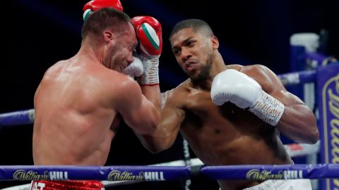 Anthony Joshua punches Kubrat Pulev during the IBF, WBA, WBO and IBO World Heayweight Title fight between Anthony Joshua and Kubrat Pulev at The SSE Arena, Wembley on December 12, 2020 in London, England.