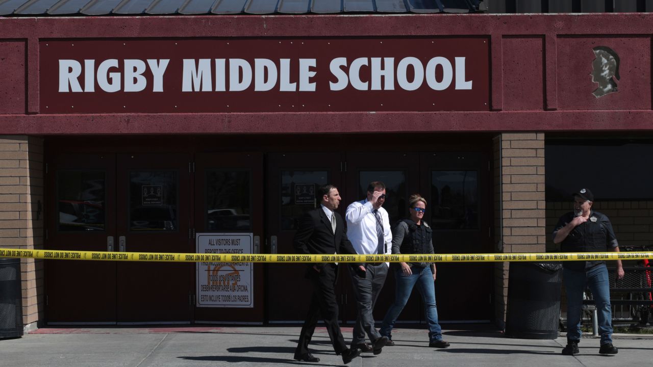 Officers leave Rigby Middle School after a shooting in Rigby, Idaho on Thursday, May 6, 2021.