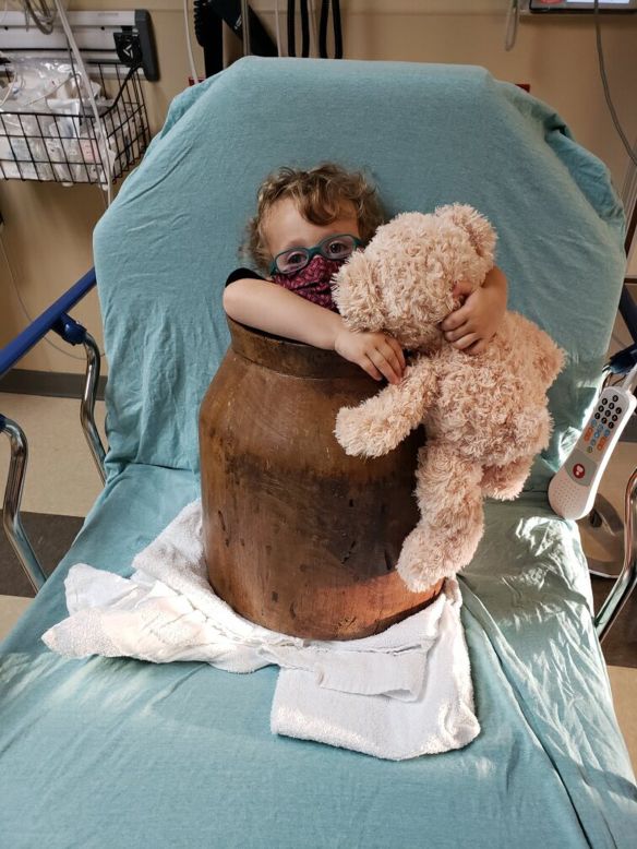 Dorian Strubing, a 2-year-old from Portland, Tennessee, hangs onto a bear that hospital workers gave him while they tried to figure out how to free him from an antique wooden barrel <a href="https://www.cnn.com/2021/05/05/us/boy-bucket-rescue-tennessee-trnd/index.html" target="_blank">he was stuck in</a> on Saturday, May 1. Firefighters were called in to help free Dorian, who was stuck in the barrel for about two hours, his dad said.