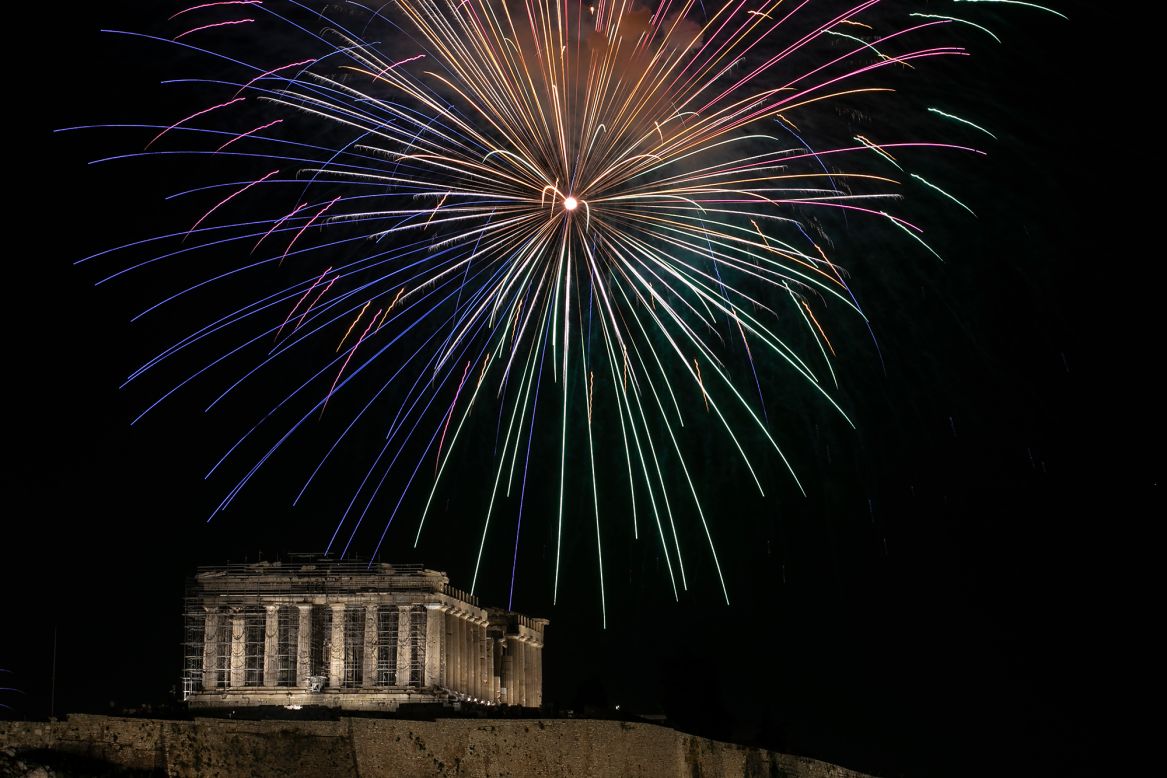 Fireworks explode over the Parthenon during Orthodox Easter celebrations in Athens, Greece, on Saturday, May 1.