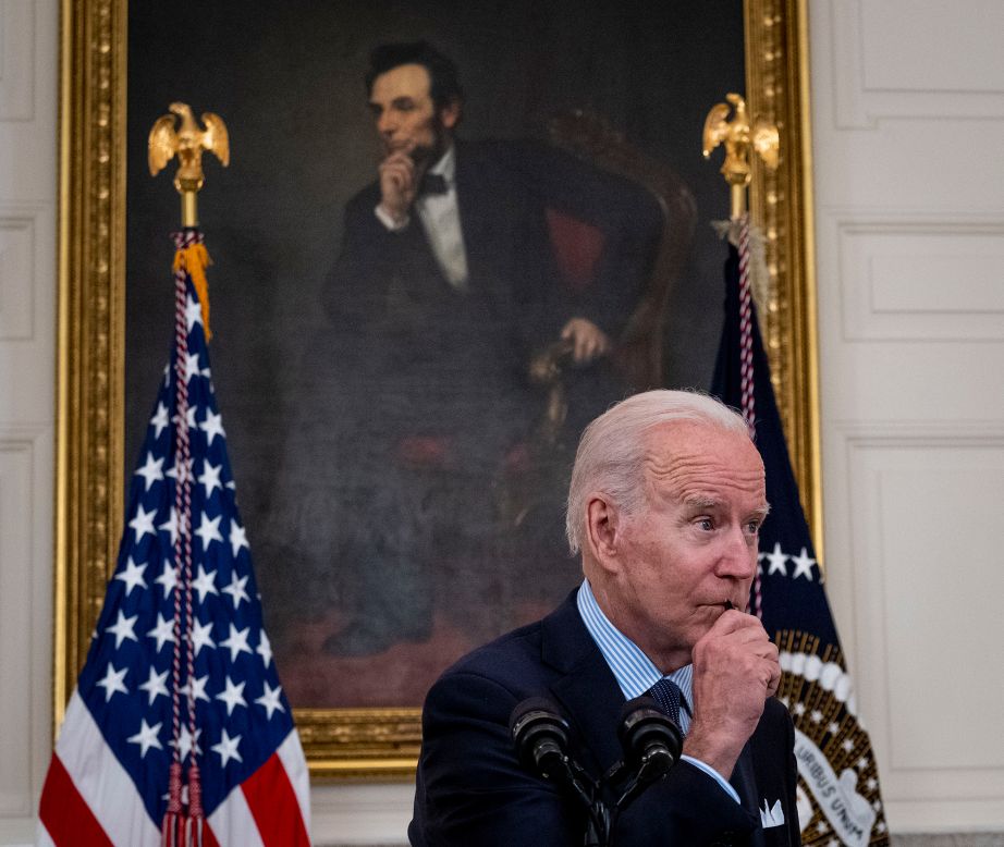 US President Joe Biden stands in front of a portrait of Abraham Lincoln as he talks about Covid-19 at the White House on Tuesday, May 4. <a href="https://www.cnn.com/2021/05/04/politics/biden-covid-goals-july-4/index.html" target="_blank">Biden announced a couple of new goals:</a> to have 160 million US adults fully vaccinated — and to administer at least one Covid-19 vaccine dose to 70% of the US adult population — by July 4.