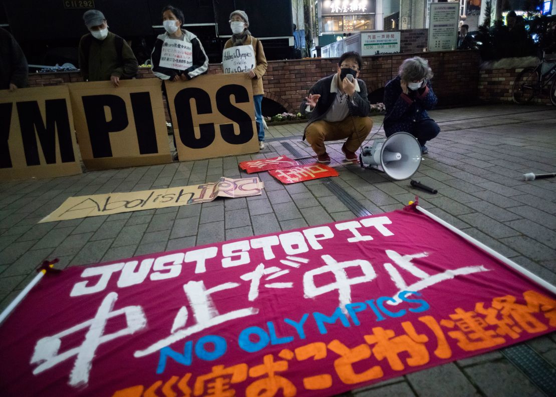 A "No Olympics" banner is displayed during a protest against the Tokyo 2021 Games.