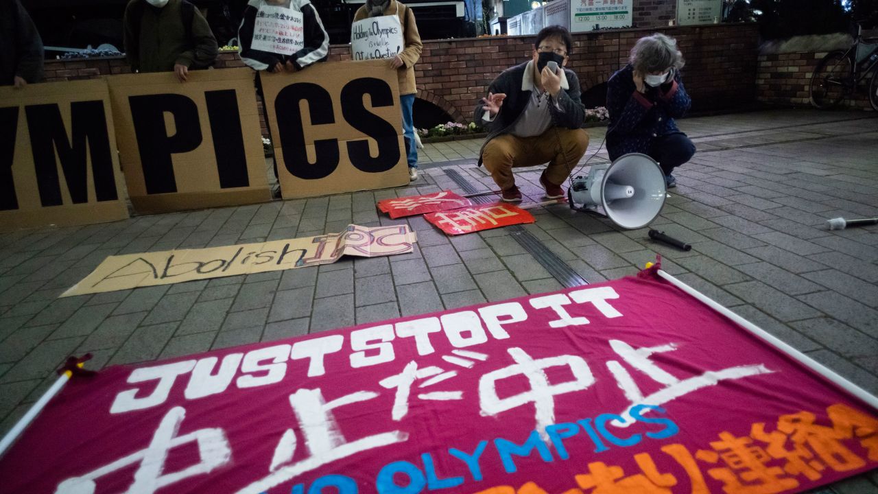 A "No Olympics" banner is displayed during a protest against the Tokyo 2021 Games.