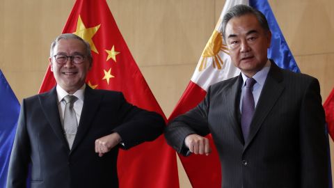 Philippine Foreign Affairs secretary Teodoro Locsin and Chinese Foreign Minister Wang Yi attend a meeting in Manila on January 16, 2021.