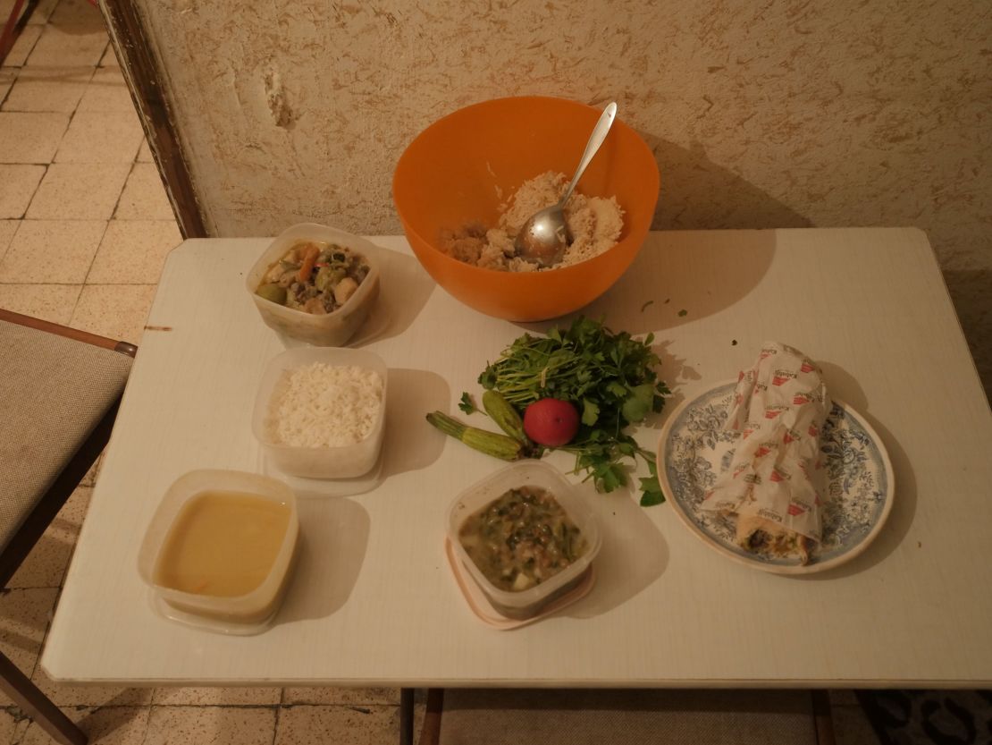 For this Iftar, Khadija has some leftover rice, lentil soup, a lentil-based dish, and a kabab sandwich she and her husband took two bites from the night before. 