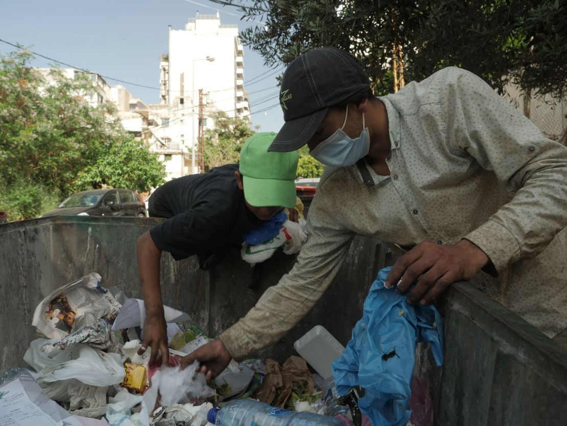Ahmad scrounges for scrap and food in Beirut's dumpsters. 