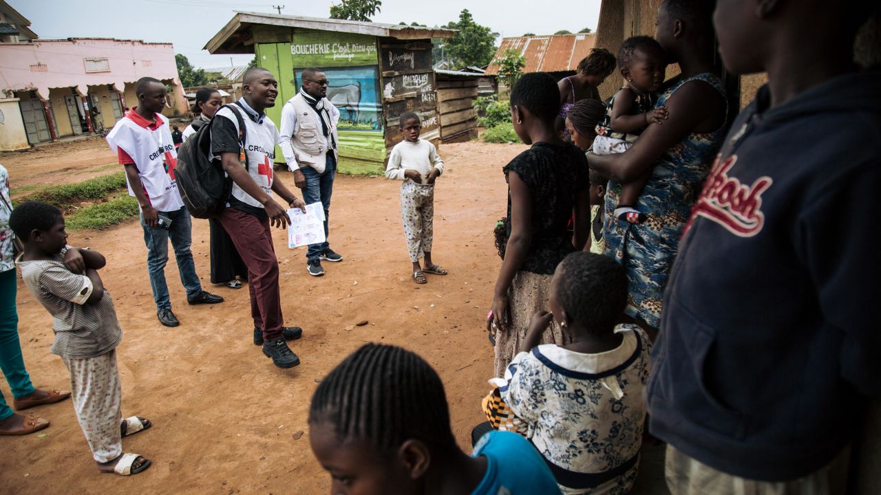 Red Cross officials in northeastern Democratic Republic of Congo meet with families in August 2019 to discuss fears surrounding Ebola and response teams. 