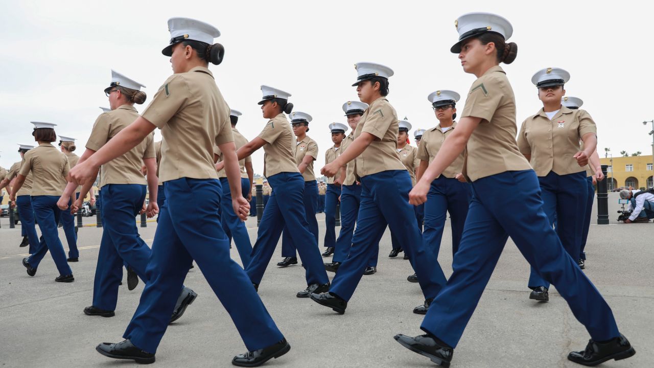 The female Marines of Platoon 3241 march together at their May graduation ceremony. 