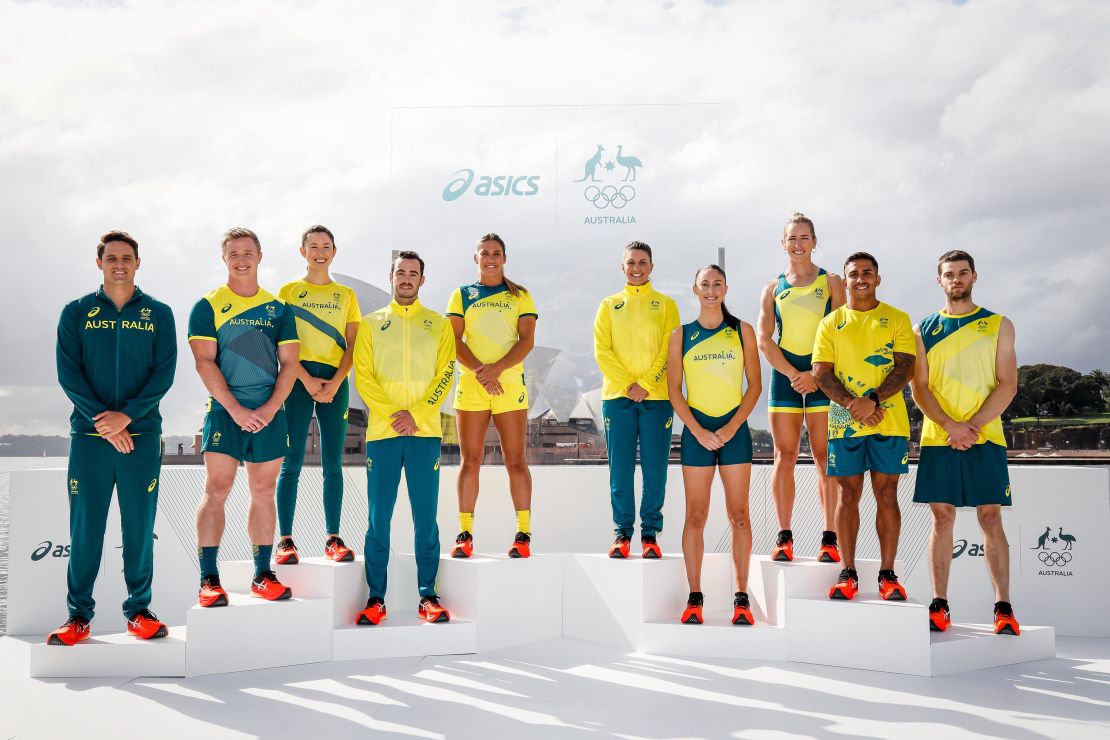 Australian Olympic athletes, including Maurice Longbottom, second from right, pose during the team's uniform unveiling in Sydney on March 31.