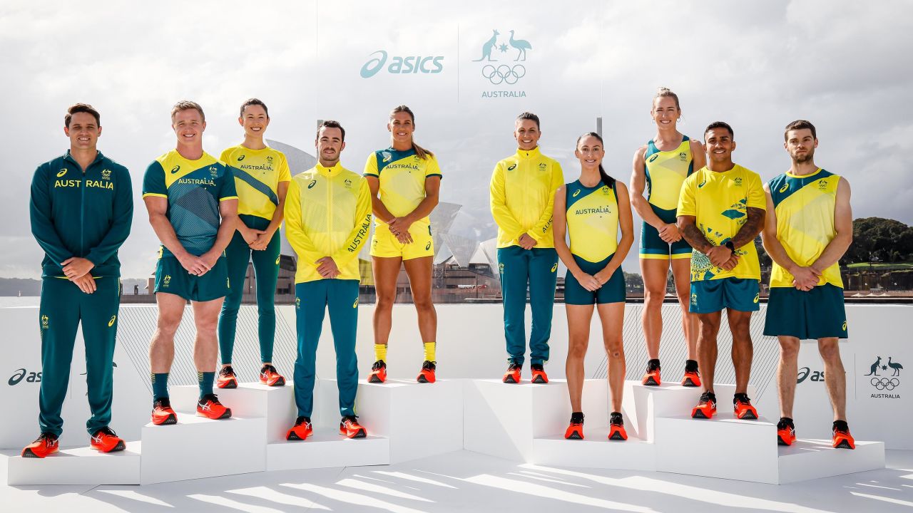 Australian Olympic athletes, including Maurice Longbottom, second from right, pose during the team's uniform unveiling in Sydney on March 31.