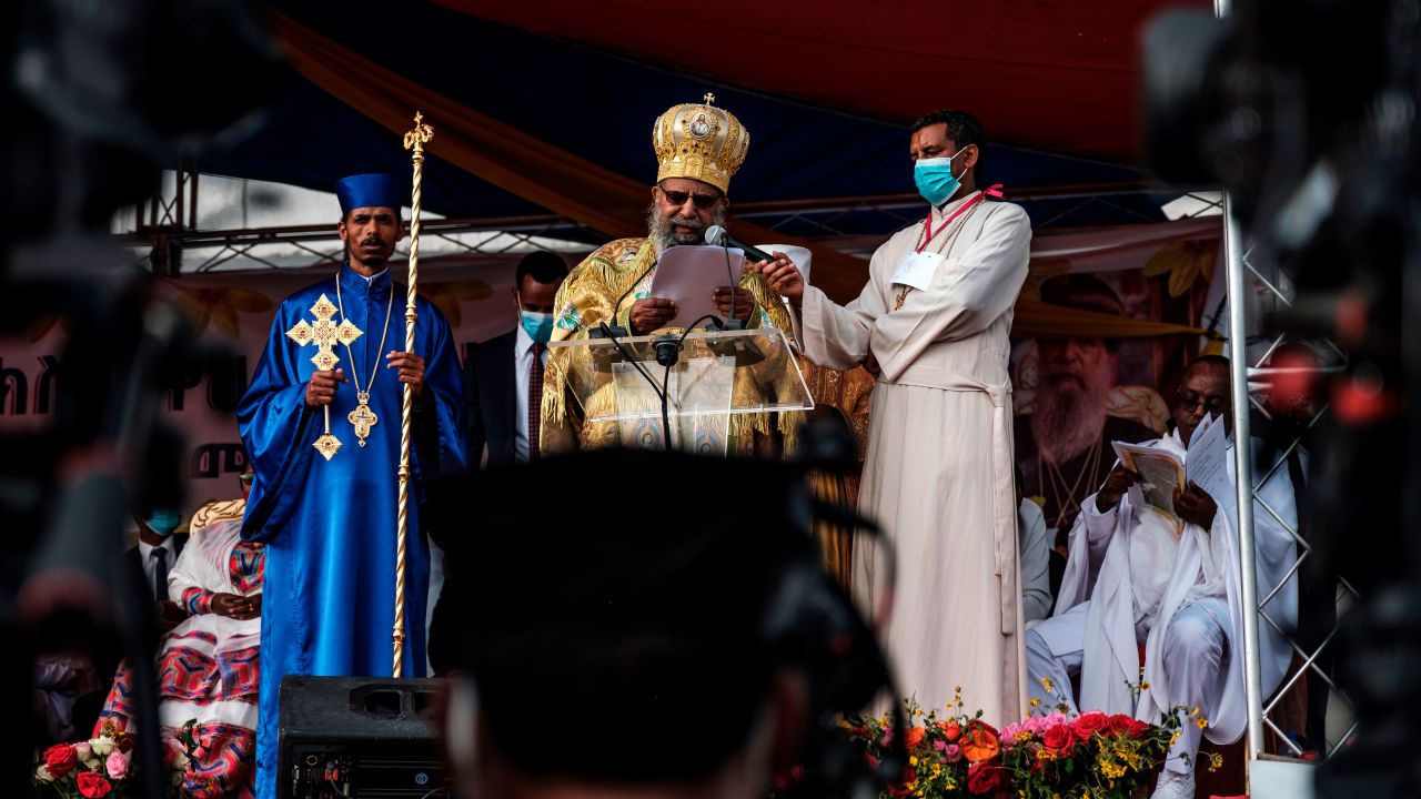 Abune Mathias, center, addresses the public during the celebration of the eve of the Ethiopian Orthodox holiday of Meskel, in Addis Ababa, on September 26.