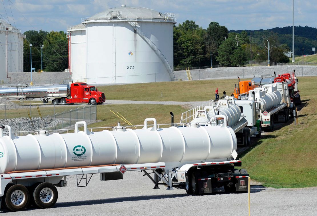 This Sept. 16, 2016, file photo shows tanker trucks lined up at a Colonial Pipeline Co. facility in Pelham, Alabama, near the scene of a 250,000-gallon gasoline spill caused by a ruptured pipeline.