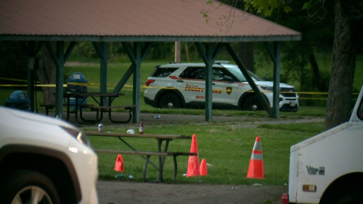 Police at the scene of Friday's shooting at a park in Kinloch, Missouri. 
