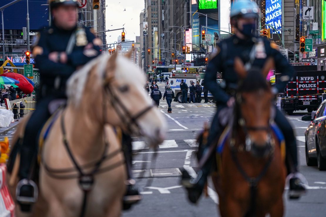 Police officers in Times Square after the shooting. 